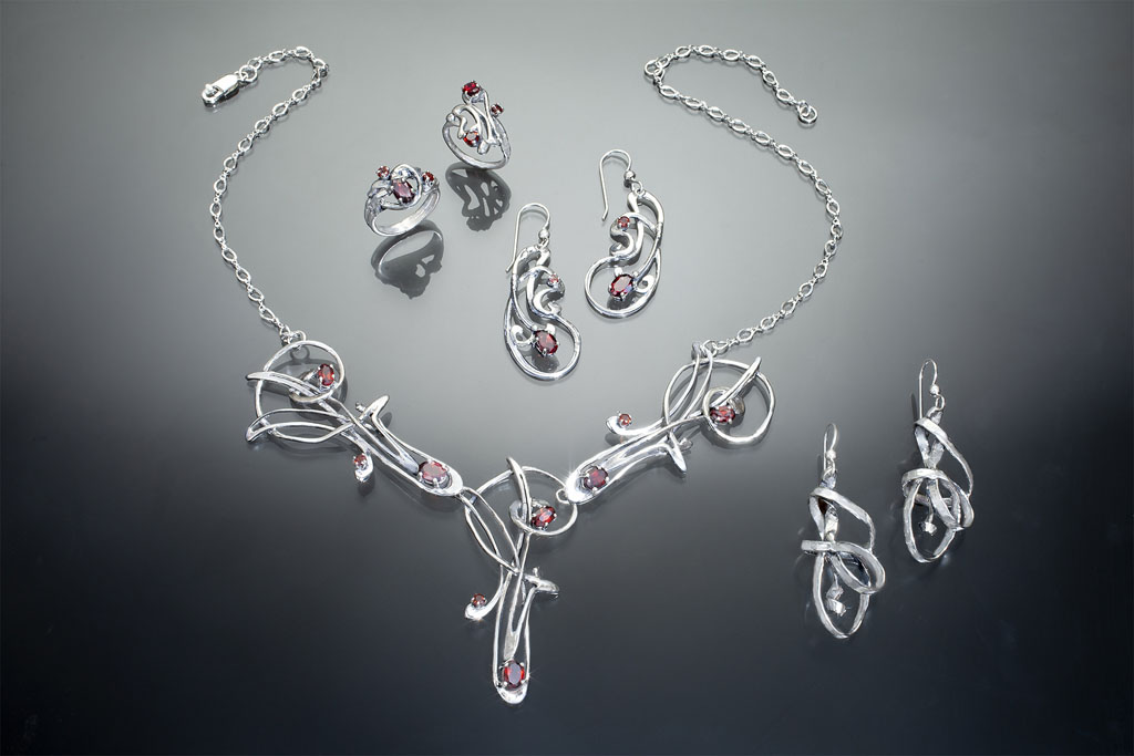 silver jewelry set with garnet